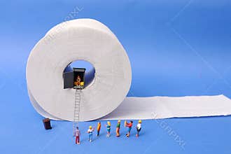 Man using pubic toilet, huge toilet paper rolling, risky