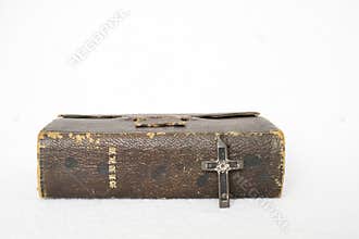 Antique Worn Leather Bible with Antique Cross Metal and Wood on