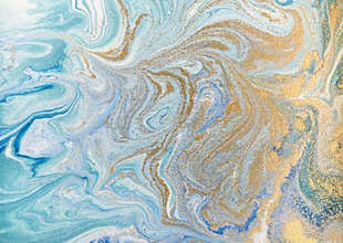 Marble abstract acrylic background. Blue marbling artwork texture. Golden glitter.
