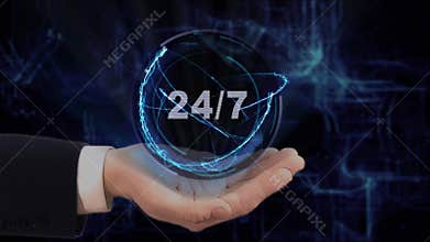 Painted hand shows concept hologram 24 7 on his hand