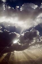 Sun rays behind clouds