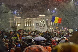 Anti government protests in Bucharest in inclement weather.