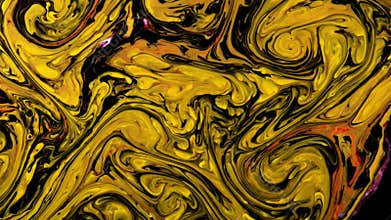 Yellow and black psychedelic patterns of multi-colored paints mixed with each other