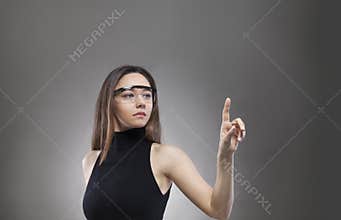 Woman touching the virtual interface