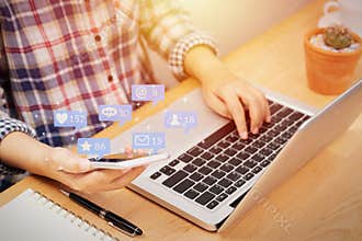 People using smartphone for social media interactions with notification icons from friend in social network with like, message