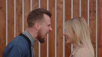 Close-up of a couple in crisis yelling.