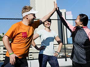 Active people at fitness gym teamwork concept