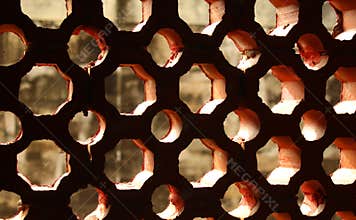 Aged window jali made from calcium carbonate composition.