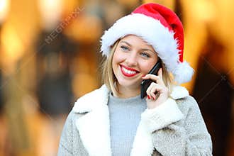 Lady calling on phone in christmas holidays
