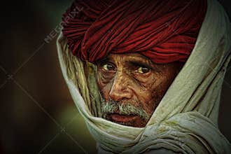 Old Rajasthani man with red turban.Festival-Pushkar