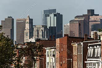 Boston city apartment buildings in front of skyline in Massachusetts USA