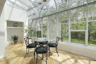 Sun room with ceiling windows