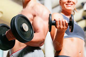 Dumbbell exercise in gym