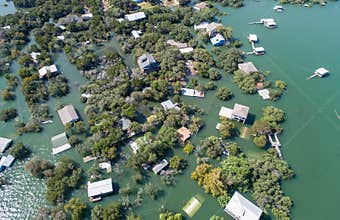 Aerial drone view enitre neighborhood under water major flooding in Central Texas
