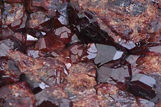 Old druse of crystals garnet stone