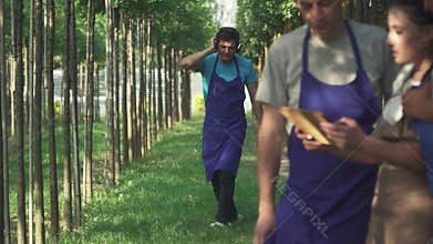 Guy in the headphones is dancing in the garden