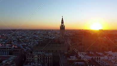 Catedral de Sevilla. Drone shot of the beautiful Spanish city of Seville at the sunrise, UHD, 4K