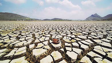 Dry cracked land, natural disaster, severe water scarcity, time-lapse, picture rotation