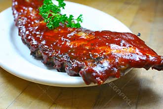 Delicious pork ribs smothered