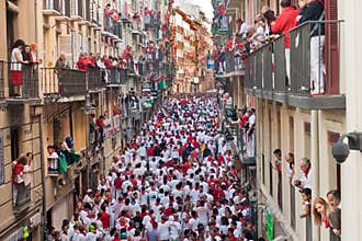 PAMPLONA-JULY 8:Bull running in the calle Estafeta