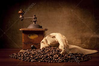 Coffe beans with juta bag and grinder