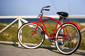 Bicycle leaning against rail