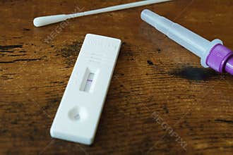 coronavirus covid-19 rapid antigen self test kit showing negative result