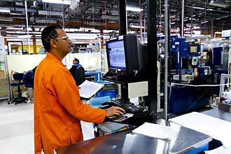 Mexican workers produce electronic components