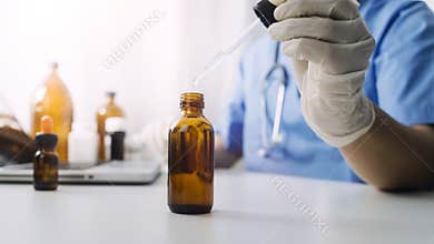 Doctor or scientist with a stethoscope holding COVID-19 vaccine, Healthcare And Medical concept, vaccine Concept fight against vir