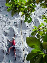 Going up climbing wall