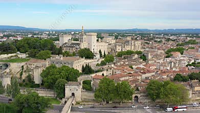 View of Avignon with Palais des Papes during sunset in Southern France. Medieval architecture along the Rhone River in Avignon,