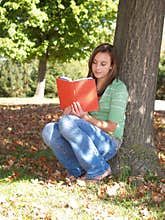 Teenager reading a book