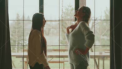 two joyful happy women friend, actively communicating talking loudly, gesturing waving their hands. adult girls