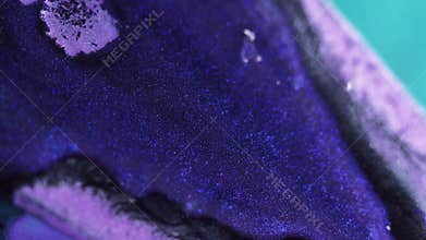 Shimmering texture wet glitter flow blue paint