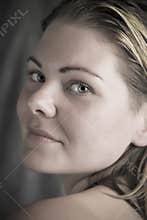 Beautiful natural woman in the daylight close up portrait