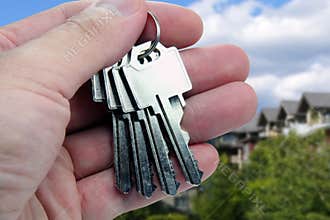 Real Estate agent hands over the keys