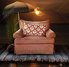 Chair on dock with sunset