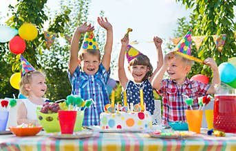 Group of kids having fun at birthday party