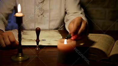 Man signs an document