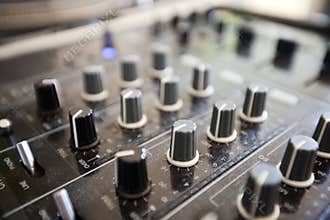 Close up of knobs on audio console