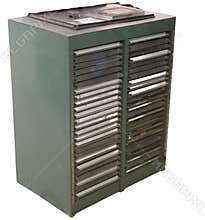 antique metal printing chest with drawers on a white background