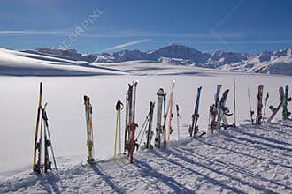 Skis and winter mountains