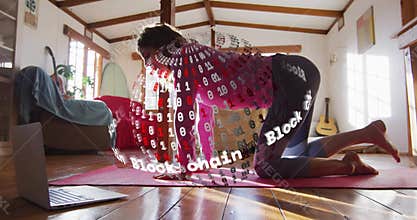 Woman kneeling mat at laptop summoning rotating blockchain sphere guiding cat-cow stretching flow