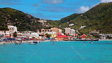 Tourists on the Caribbean beach, summer vacation