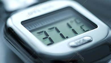 Digital Thermometer Displaying Elevated Body Temperature Indicating Fever Illness Or Sickness Healthcare Medical Device Close Up