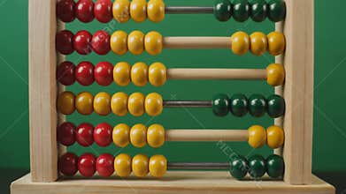 Close-up of Vibrant Wooden Abacus Beads for Arithmetic Learning Tool