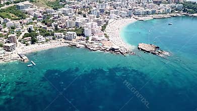 An all round drone video of the promenade of Dobra Voda with resorts restaurants and bars