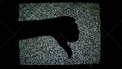 Thumb up and thumb down for like and dislike or Approval and disapproval concept against static TV noise background