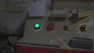 Industrial Panel With Warning Light, Control Board Shows Warning Indicator Amidst Dusty Surroundings. Media