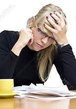 Stressed woman with bills